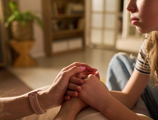 parent practicing coping skills for teens with a grounding technique